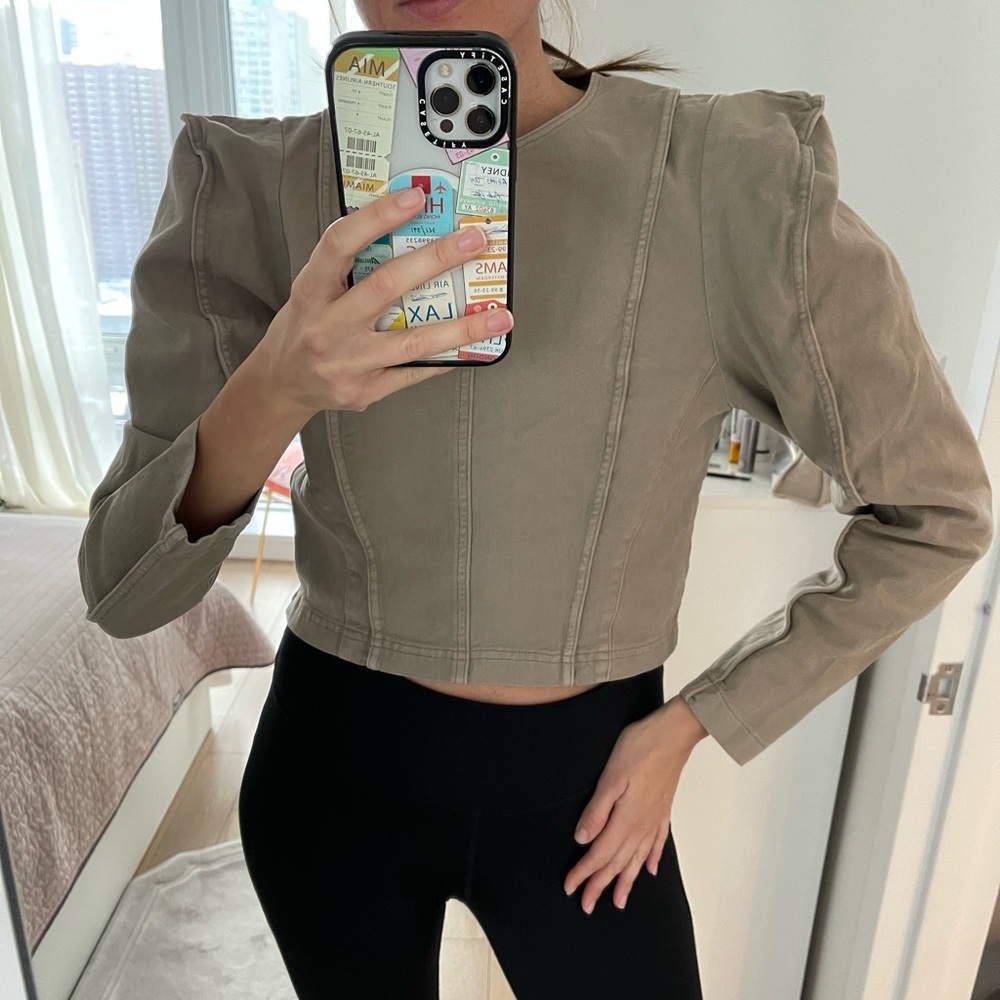 Studio H&M Collection. Short top in stretch denim